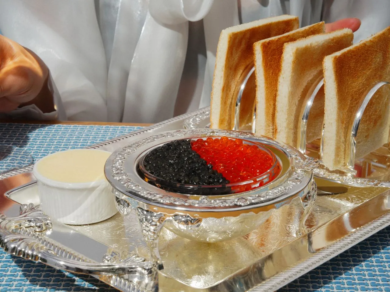 Caviar signature dish with classic accompaniments
